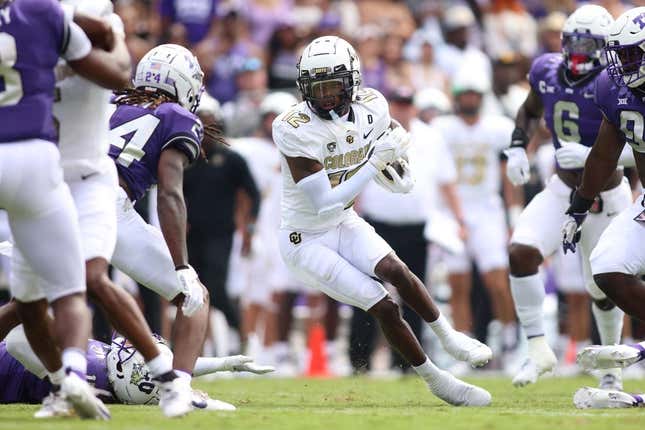 Sep 2, 2023; Fort Worth, Texas, USA; Colorado Buffaloes wide receiver Travis Hunter (12) runs after catching a ball in the first half against the TCU Horned Frogs at Amon G. Carter Stadium.