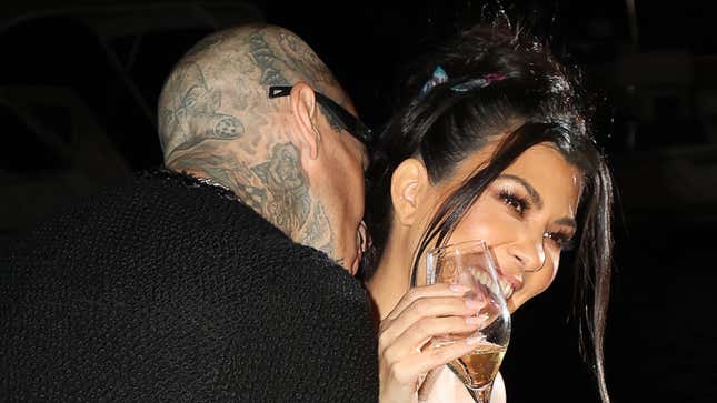 Image for article titled Kourtney Kardashian&#39;s 3rd Wedding Look Was an Homage to Travis Barker&#39;s Head Tattoo