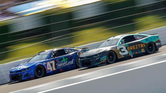 A photo of two Nascar racers on track in Pocono. 