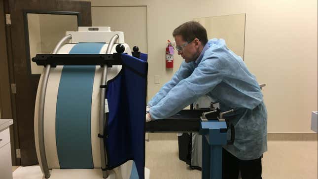 Positioning a head on a CT scanner.