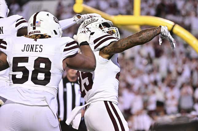 Sep 9, 2023; Starkville, Mississippi, USA; Mississippi State Bulldogs running back Jeffery Pittman (25) reacts teammates after a touchdown against the Arizona Wildcats during overtime at Davis Wade Stadium at Scott Field.