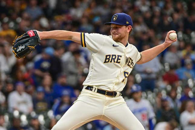 May 9, 2023; Milwaukee, Wisconsin, USA;  Milwaukee Brewers pitcher Eric Lauer (52) pitches against the Los Angeles Dodgers in the first inning at American Family Field.