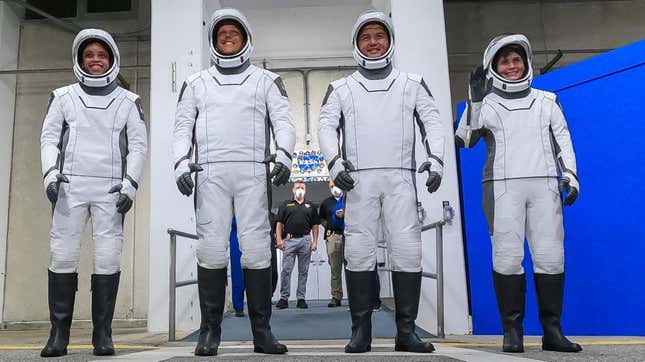 NASA’s SpaceX Crew-4 astronauts, from left, Jessica Watson, Bob Hines, and Kjell Lindgren, and ESA astronaut Samantha Cristoforetti stand outside Kennedy Space Center’s Neil Armstrong Operations and Checkout Building during a dry dress rehearsal on April 20, 2022. 