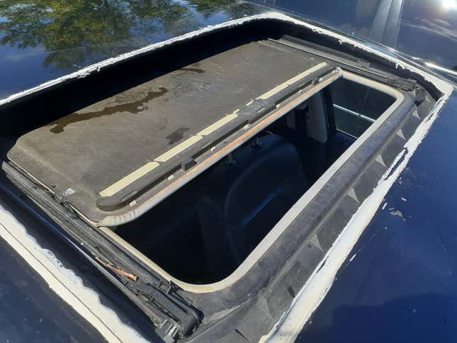 Image for article titled How I Fixed A Broken Sunroof In One Of The Most Unreliable Cars Of The Modern Era