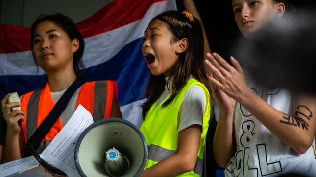 Climate activist Ralyn “Lilly” Satidtanasarn, age 12, rallies outside the Ministry of Natural Resources and Environment in Bangkok, Thailand, on September 20, 2019.