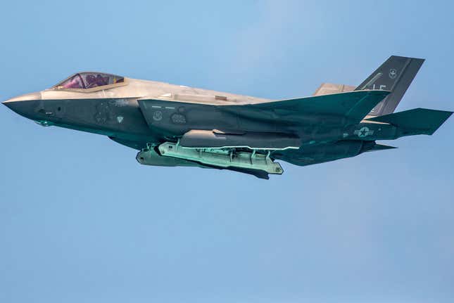 A U.S. Air Force F-35A flying with weapons bay doors open over Miami Beach, Florida.