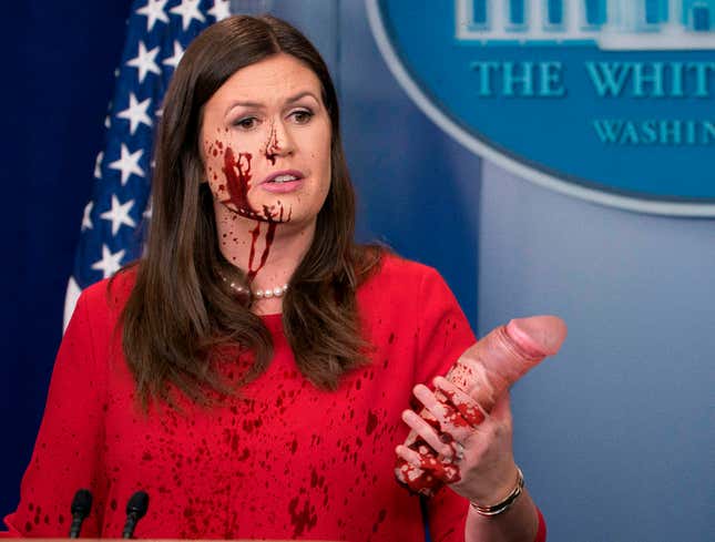 Image for article titled Blood-Spattered Sarah Huckabee Sanders Holds Up Huge Dismembered Penis To Prove Presidential Member Completely Normal