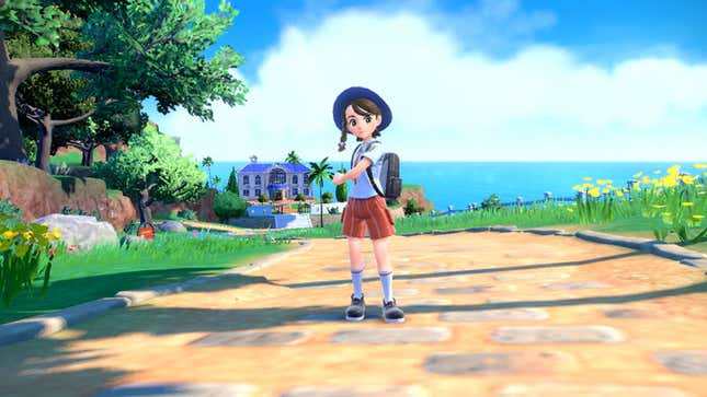 A Pokémon trainer stands on a sunny street in Scarlet and Violet.