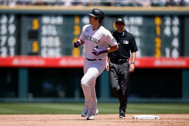 Jul 16, 2023; Denver, Colorado, USA; Colorado Rockies first baseman Michael Toglia (4) rounds the bases on a solo home run in the second inning against the New York Yankees at Coors Field.