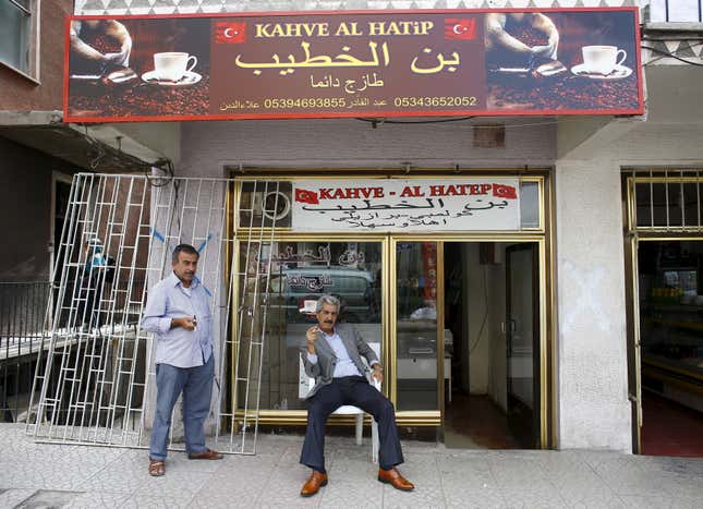 Some Syrians are integrating into the local labor market, such as this shop owner in Ankara.