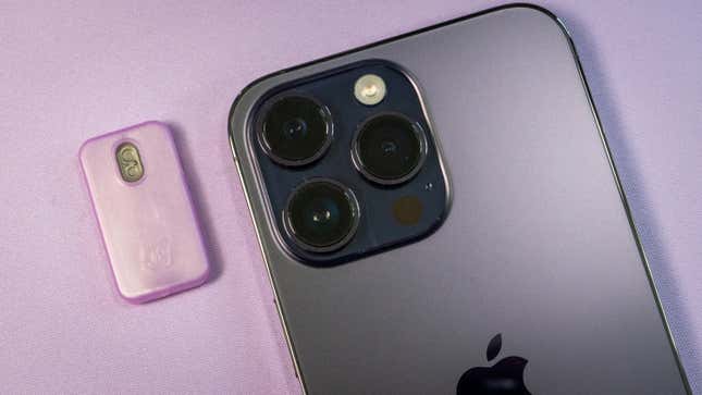 An iPhone 14 Pro with its cameras sticking out.