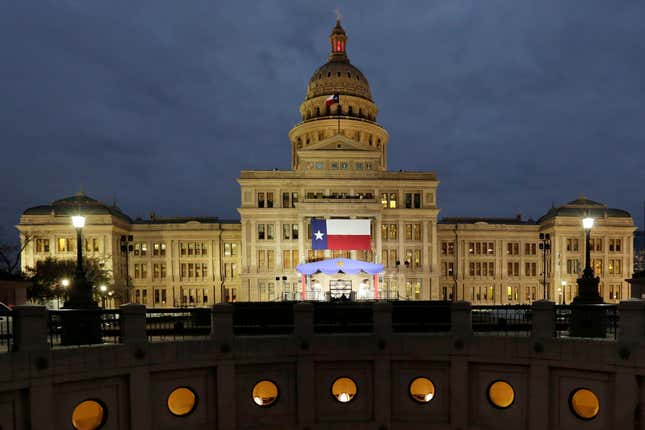 FILE - In this Jan. 14, 2019 file photo, a large Texas flag hangs from the Texas State Capitol in Austin, Texas. A federal judge has struck down a Texas law requiring age verification and health warnings to view pornographic websites and blocked the state attorney general&#39;s office from enforcing it. U.S. District Judge David Ezra on Thursday, Aug. 31, 2023 agreed with claims that the bill signed into law by Gov. Greg Abbott in June violates free speech rights, is overbroad and vague.(AP Photo/Eric Gay, File)