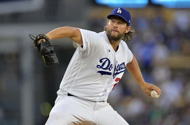 Aug 16, 2023; Los Angeles, California, USA;  Los Angeles Dodgers starting pitcher Clayton Kershaw (22) throws to the plate in the second inning against the Milwaukee Brewers at Dodger Stadium.