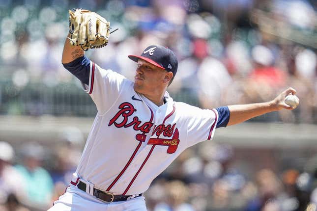 Jun 28, 2023; Cumberland, Georgia, USA; Atlanta Braves starting pitcher Kolby Allard (49) pitches against the Minnesota Twins during the second inning at Truist Park.