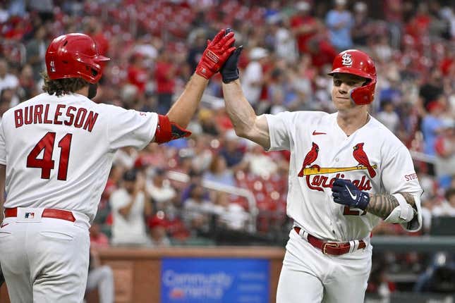Aug 2, 2023; St. Louis, Missouri, USA;  St. Louis Cardinals left fielder Tyler O&#39;Neill (27) is congratulated by designated hitter Alec Burleson (41) after hitting a solo home run against the Minnesota Twins during the second inning at Busch Stadium.