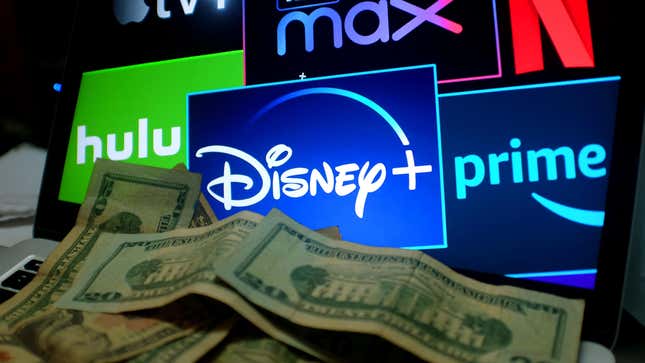 Several screens with streaming service logos like Hulu, Disney+, Prime Video, Netflix behind a pile of money