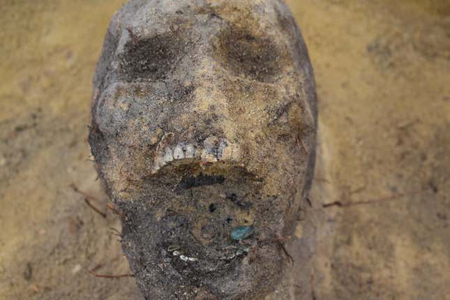 Some skeletons were found with coins in their mouths.
