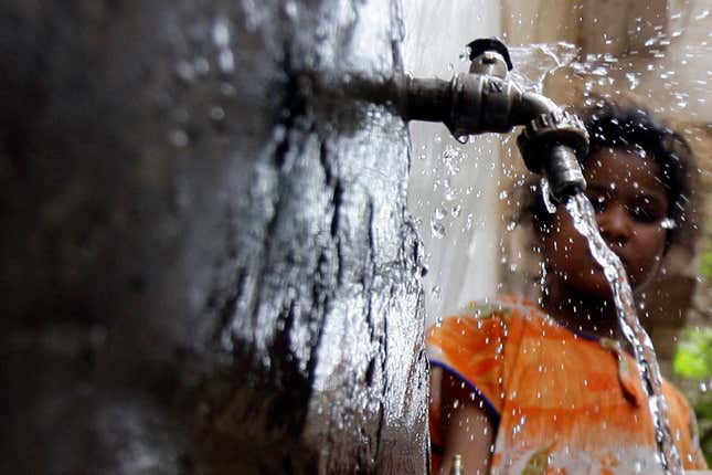 Water from the Nile flows from a pump in eastern Cairo, Egypt.
