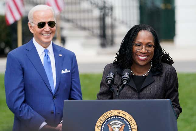 President Joe Biden listens as Judge Ketanji Brown Jackson speaks during an event on the South Lawn of the White House in Washington, April 8, 2022