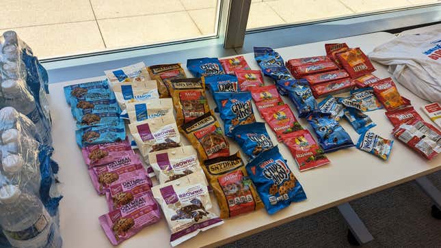 Array of packaged snacks on Red Cross blood donation table