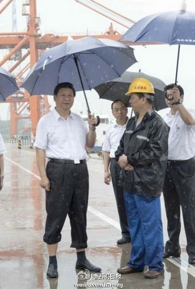 Image for article titled Why it’s news that China’s president stood in the rain with his pants rolled up