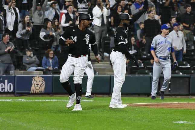 Sep 12, 2023; Chicago, Illinois, USA; Chicago White Sox designated hitter Eloy Jimenez (74) scores against the Kansas City Royals during the sixth inning at Guaranteed Rate Field.