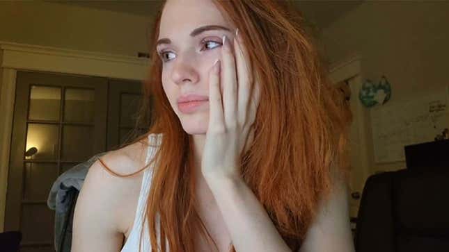 Twitch star Amouranth looks to the left.