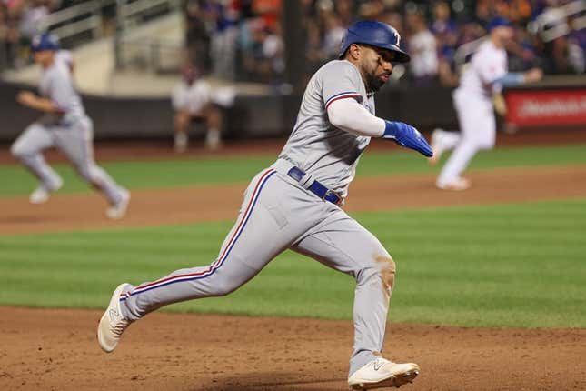 Aug 28, 2023; New York City, New York, USA; Texas Rangers shortstop Ezequiel Duran (20) rounds third base during the ninth inning against the New York Mets at Citi Field.