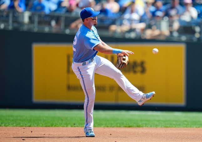 Sep 3, 2023; Kansas City, Missouri, USA; Kansas City Royals second baseman Nick Loftin (12) throws to first base during the second inning against the Boston Red Sox at Kauffman Stadium.