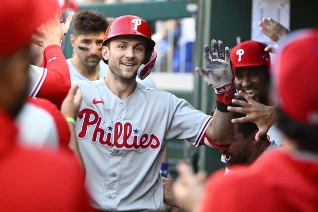 Aug 19, 2023; Washington, District of Columbia, USA; Philadelphia Phillies shortstop Trea Turner (7) is congratulated by teammates after hitting his second home run of the eighth inning against the Washington Nationals at Nationals Park.