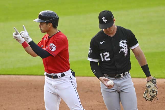 May 22, 2023; Cleveland, Ohio, USA; Cleveland Guardians left fielder Steven Kwan (38) celebrates his double beside Chicago White Sox second baseman Romy Gonzalez (12) in the third inning at Progressive Field.