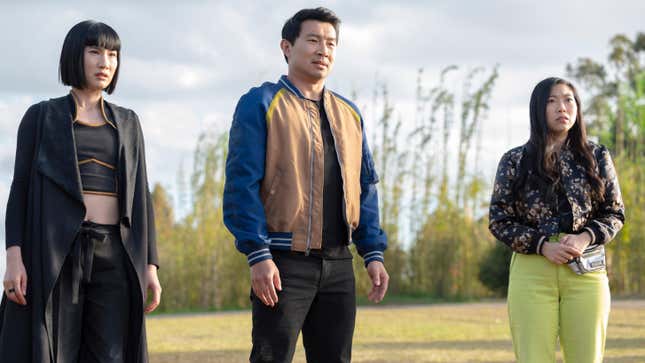 Meng’er Zhang, Simu Liu, and Awkwafina stand together in a scene from Shang-Chi and the Legend of the Ten Rings.