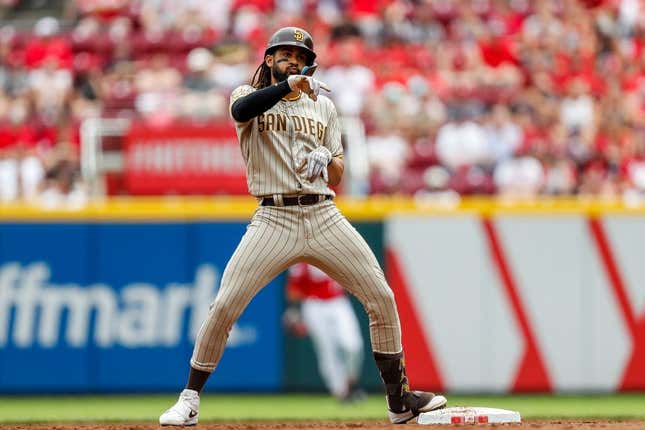 Jul 1, 2023; Cincinnati, Ohio, USA; San Diego Padres right fielder Fernando Tatis Jr. (23) reacts after hitting a RBI double against the Cincinnati Reds in the third inning at Great American Ball Park.