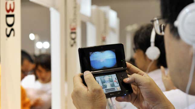 A person tests the Nintendo 3DS in 2010.