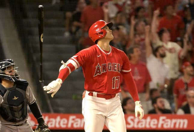 Jul 17, 2023; Anaheim, California, USA;  Los Angeles Angels designated hitter Shohei Ohtani (17) flips his bat after hitting a two-run home run in the seventh inning against the New York Yankees at Angel Stadium.
