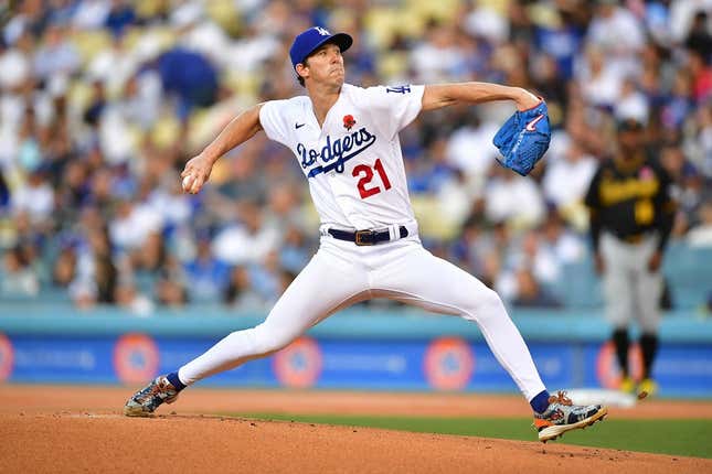 May 30, 2022; Los Angeles, California, USA; Los Angeles Dodgers starting pitcher Walker Buehler (21) throws against the Pittsburgh Pirates during the first inning at Dodger Stadium.