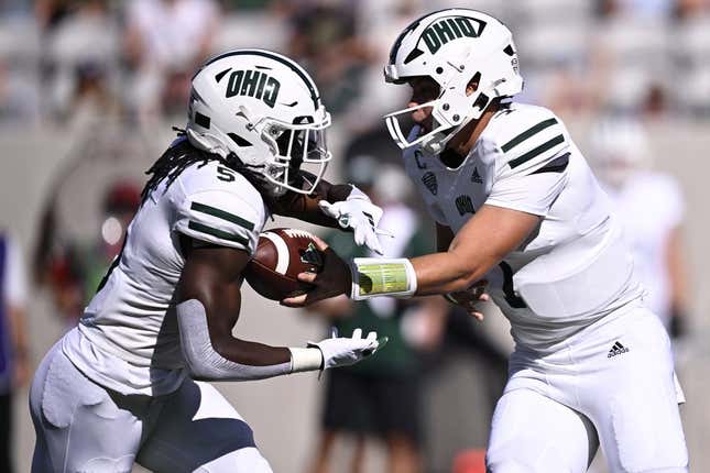 Aug 26, 2023; San Diego, California, USA; Ohio Bobcats quarterback Kurtis Rourke (7) hands off to running back Sieh Bangura (5) during the first half against the San Diego State Aztecs at Snapdragon Stadium.