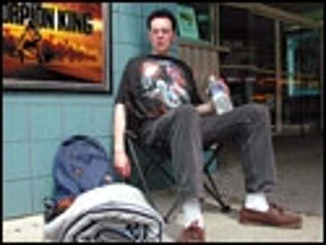Image for article titled Frugal Star Wars Fan Camping Out In Front Of 99-Cent Theater