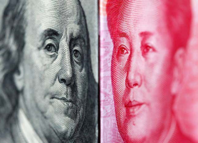 A 100 yuan banknote is placed beside a U.S. 100 dollar banknote in this illustrative photograph taken in Taipei June 20, 2010. China has ended its "crisis-mode" pegging of the yuan to the dollar with a statement that it will gradually increase the flexibility of its exchange rate, an adviser to the central bank Li Daokui told Reuters on Saturday. The notes feature the portraits of Mao Zedong and Benjamin Franklin. REUTERS/Nicky Loh (TAIWAN - Tags: BUSINESS POLITICS) - RTR2FFH9