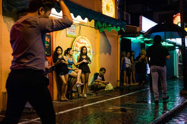 A scene from Fields Avenue, the red light district in Angeles City, notorious for its sex tourism. It is widely known that about 80% of the women working in its bars are from climate change vulnerable areas, Samar and Leyte. In the wake of typhoons, women and girls wind up in the sex trade after being displaced from storms.