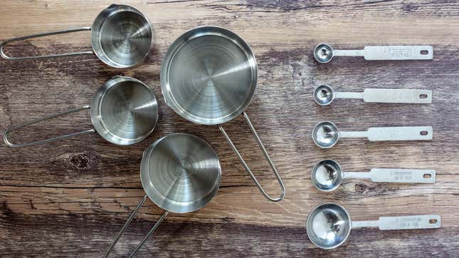Measuring cups and spoons on a table.