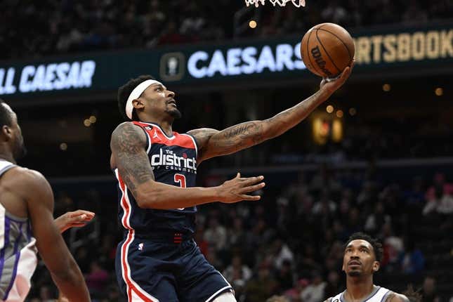 Mar 18, 2023; Washington, District of Columbia, USA; Washington Wizards guard Bradley Beal (3) scores against the Sacramento Kings during the second half at Capital One Arena.