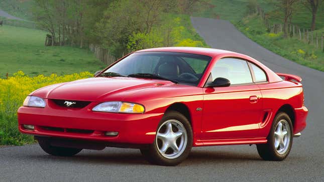 A photo of a red SN-95 Ford Mustang. 