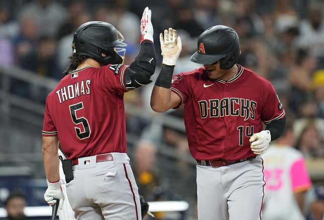 Aug 17, 2023; San Diego, California, USA;  Arizona Diamondbacks catcher Gabriel Moreno (14) is greeted by center fielder Alek Thomas (5) after hitting a solo home run against the San Diego Padres during the fifth inning at Petco Park.