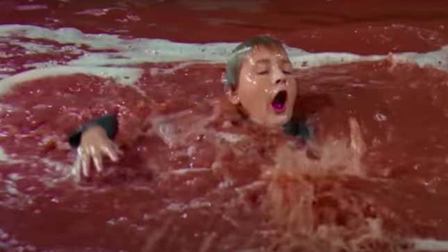 Augustus Gloop in the chocolate river in "Willy Wonka and the Chocolate Factory"