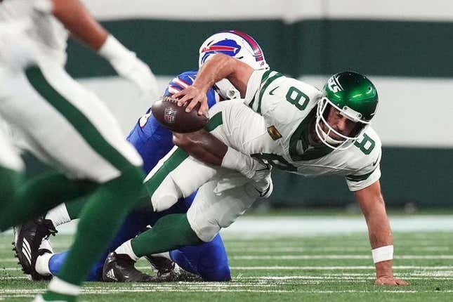 Buffalo Bills defensive end Leonard Floyd (56) sacks New York Jets quarterback Aaron Rodgers (8) early in the first quarter during the home opener at MetLife Stadium on Monday, Sept. 11, 2023, in East Rutherford. Rodgers was carted off the field after being hit.