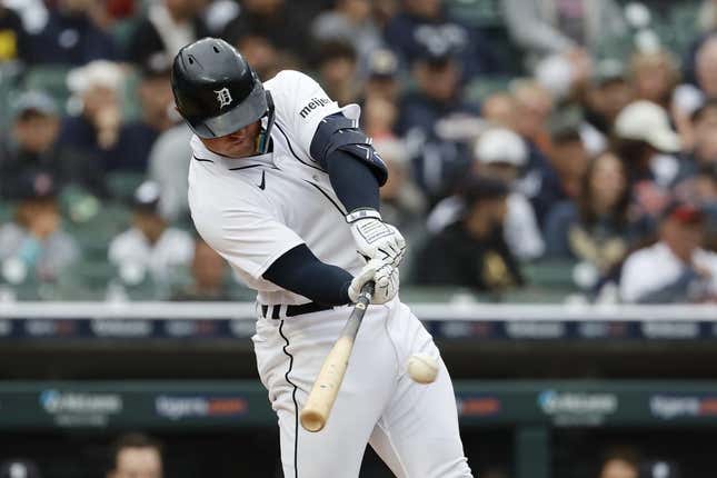 Jun 12, 2023; Detroit, Michigan, USA;  Detroit Tigers first baseman Spencer Torkelson (20) hits a single in the first inning against the Atlanta Braves at Comerica Park.