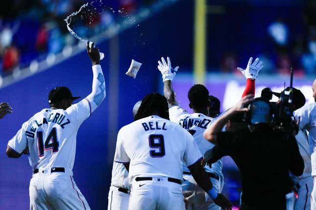 Aug 2, 2023; Miami, Florida, USA; Miami Marlins celebrates after defeating the Philadelphia Phillies during the twelfth inning at loanDepot Park.