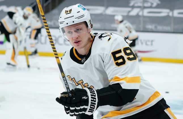 Apr 3, 2021; Boston, Massachusetts, USA; Pittsburgh Penguins left wing Jake Guentzel (59) warms up before the start of the game against the Boston Bruins at TD Garden.