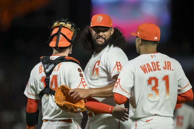 Aug 1, 2023; San Francisco, California, USA;  San Francisco Giants relief pitcher Sean Manaea (52) celebrates with catcher Patrick Bailey (14) and first baseman LaMonte Wade Jr. (31) after a win against the Arizona Diamondbacks at Oracle Park.